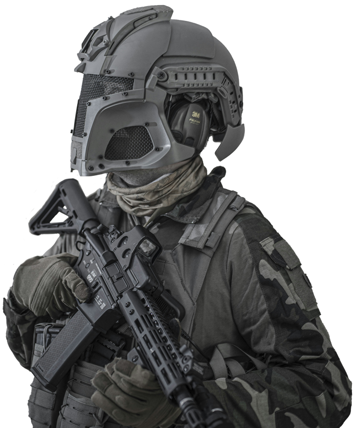 Airsoft player camouflage holding gun